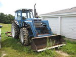 1987 Ford 7710 II 4wd tractor w/ loader bucket Auction Photo