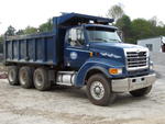 2000 Sterling LT9511 tri-axle dump truck Auction Photo