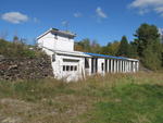 Earth-berm Home Auction Photo