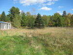 Earth-berm Home Auction Photo