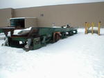 Double vibrating conveyor 76ft x 4ft. Auction Photo