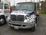 2005 Int'l. 4300, Chevron HD Series 14 Ramp Body Auction Photo