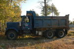 1985 GMC General tandem axle dump truck Auction Photo