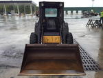 1997 NEW HOLLAND LX565 SKIDSTEER Auction Photo
