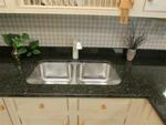 GLENWOOD CABINETRY, NATURAL GRANITE COUNTERTOP Auction Photo