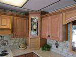 HOMECREST CABINETRY IN MAPLE W/ GINGER STAIN COCOA GLAZE Auction Photo