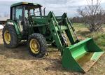 1999 JOHN DEERE 6110 4WD TRACTOR Auction Photo