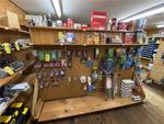 ESTATE AUCTION - TRUCKS - TRAILERS - FORKLIFT - CAMPER - BOAT - HARDWARE STORE INVENTORY Auction Photo