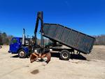 2003 VOLVO WXLL42 W/ DUMP & CRANE Auction Photo