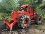 1985 TIMBER JACK 450 CABLE SKIDDER Auction Photo