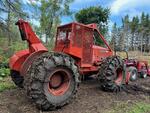 1985 TIMBER JACK 450 CABLE SKIDDER Auction Photo