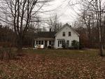 3BR Cape Style Home .94+/- Acres Auction