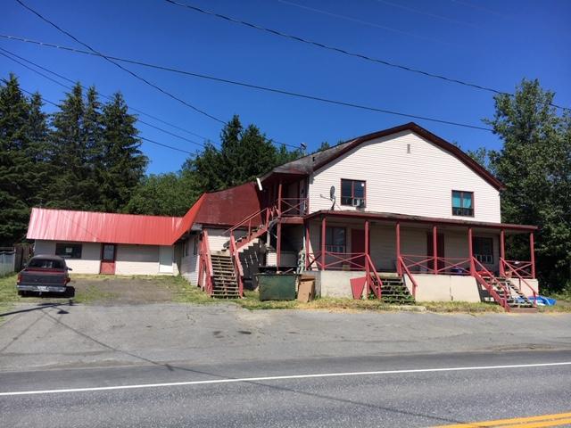 6-Unit Apartment Building - Laundromat Auction
