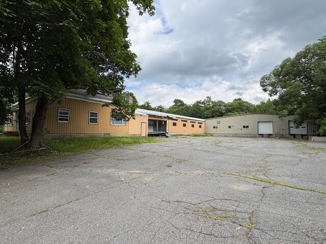 28,395+/-SF Mixed-Use Building 2.25+/- Acres Auction