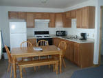 Repair Facility  Restaurant (4) - Rental Cabins  (2) Bldg. Lots - Rolling Stock & Shop Equip. Auction Photo