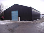 Repair Facility  Restaurant (4) - Rental Cabins  (2) Bldg. Lots - Rolling Stock & Shop Equip. Auction Photo
