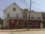 Neighborhood Store  (3) Apartments Auction Photo