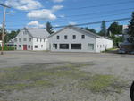 Parts Building & Showroom from across Depot St. Auction Photo