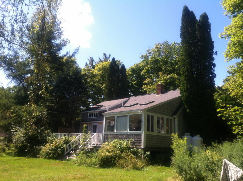 Cape Home - Guest Cottage - Barn Boathouse & 6.76+/- Acres Auction Photo