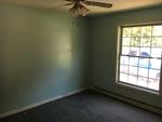 3BR Ranch Home  10+/- Acres Auction Photo