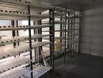 3,000+/- SF Com. Bldg/Store with (4) Apts -  2,148+/- SF  Garage – (7) Storage Units Auction Photo