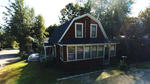 4BR Gambrel Style Home - .11+/- Acres Auction Photo
