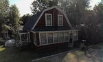 4BR Gambrel Style Home - .11+/- Acres Auction Photo