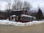 4BR Gambrel Style Home - .11+/- Acres Auction Photo