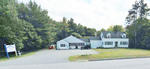 Mixed-Use Bldg - Gen. Dev. Zone - Kennel/Grooming Facility & Rental Home Auction Photo