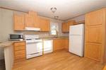 2BR 2010 Champion Manufactured Home - Rented Lot Auction Photo