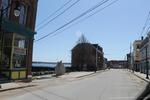 7,687+/-SF Mixed - Use Brick Building -  Water Views - .10+/- Acres  Auction Photo