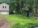 2BR Ranch Home – Garage – .34+/- Acres – Water Access Auction Photo