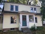 Tax Acquired Property  4-BR Dutch Colonial Home Auction Photo