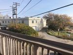 7,004+/-SF Coml/Restaurant Bldg Deck & Harbor Views  Auction Photo