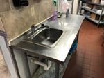 Selling with real estate - Sink Table Auction Photo