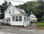 3BR Cape Style Home - Garage - .11+/- Acres Auction Photo