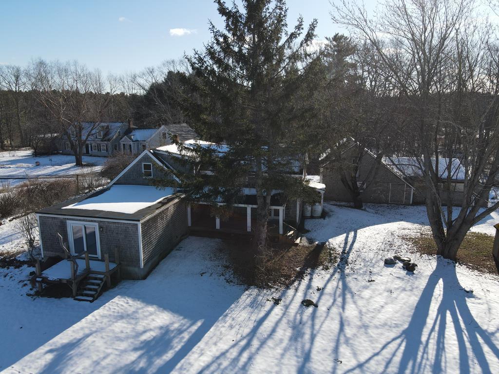 3BR Cape – In-Law Apt. – Barn/Office/Workshop – 3.9+/- Acre Field Auction Photo