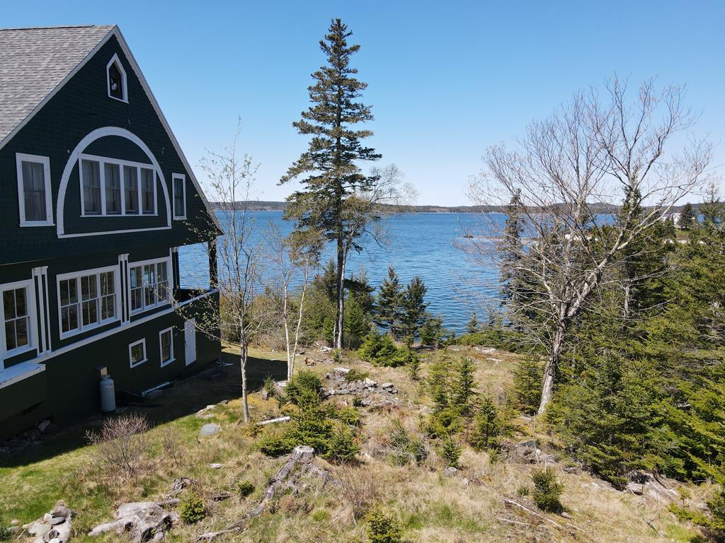 Classic Maine Summer Cottage ~ Oceanfront on Eggemoggin Reach Auction Photo