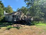 1-BR Ranch Home - Garage - .80+/- Acres Auction Photo