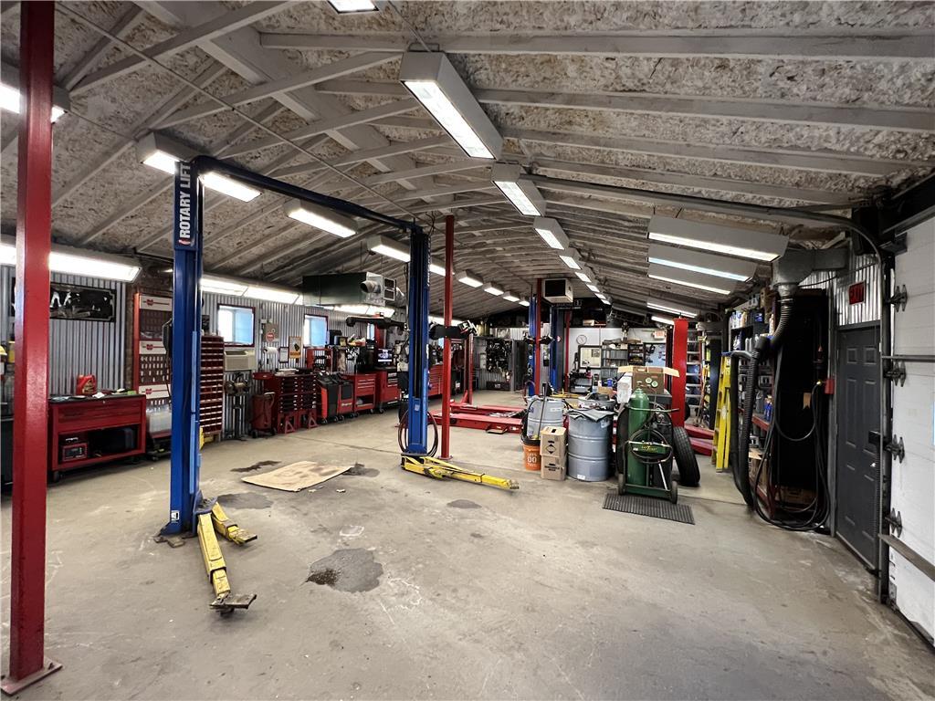 3,600+/- SF Automotive Repair Facility .97+/-Acres RE: Elite Motors, Inc. Auction Photo