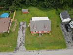 3BR Cape Home - .17+/- Acres Auction Photo