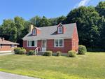 3BR Cape Home - .17+/- Acres Auction Photo