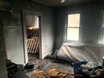 Fire Damaged 3-Family Home Auction Photo