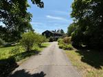 6,129+/-SF 6BR Dutch Colonial Home  5.25+/- Acres Auction Photo