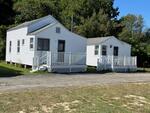 Sea Latch Inn ~ 82-Room Lodging Complex - Ocean Views - 2+/- Acres  Auction Photo