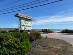 Sea Latch Inn ~ 82-Room Lodging Complex - Ocean Views - 2+/- Acres  Auction Photo