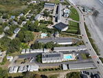 Sea Latch Inn ~ 82-Room Lodging Complex - Ocean Views - 2+/- Acres  Auction Photo