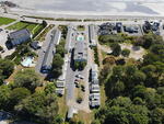 Sea Latch Inn ~ 82-Room Lodging Complex - Ocean Views - 2+/- Acres  Auction Photo