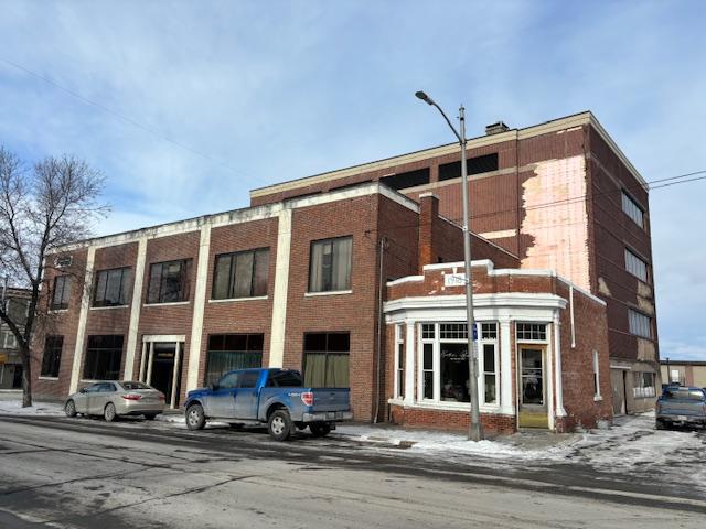 39,410+/- SF Mixed-Use Commercial/Office Building - .55+/- Acres  Auction Photo