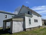 3BR Cape Home - .11+/- Acres Auction Photo